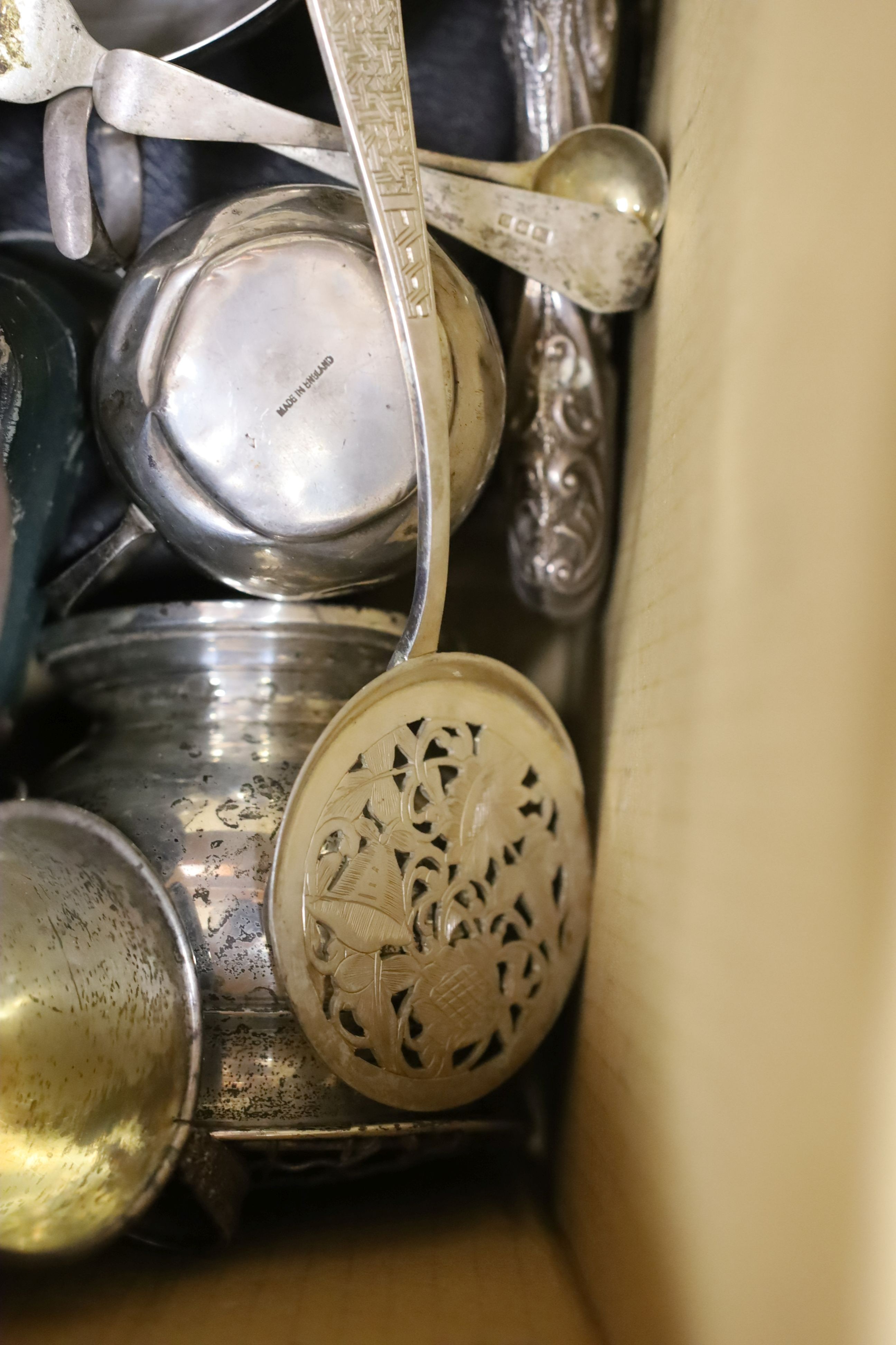 A collection of assorted sterling or silver items, including a cased set of five (ex 6) silver and tortoiseshell menu holders, bowls, mugs, flatware, three cased salts, pairs of serving spoons, etc and other white metal